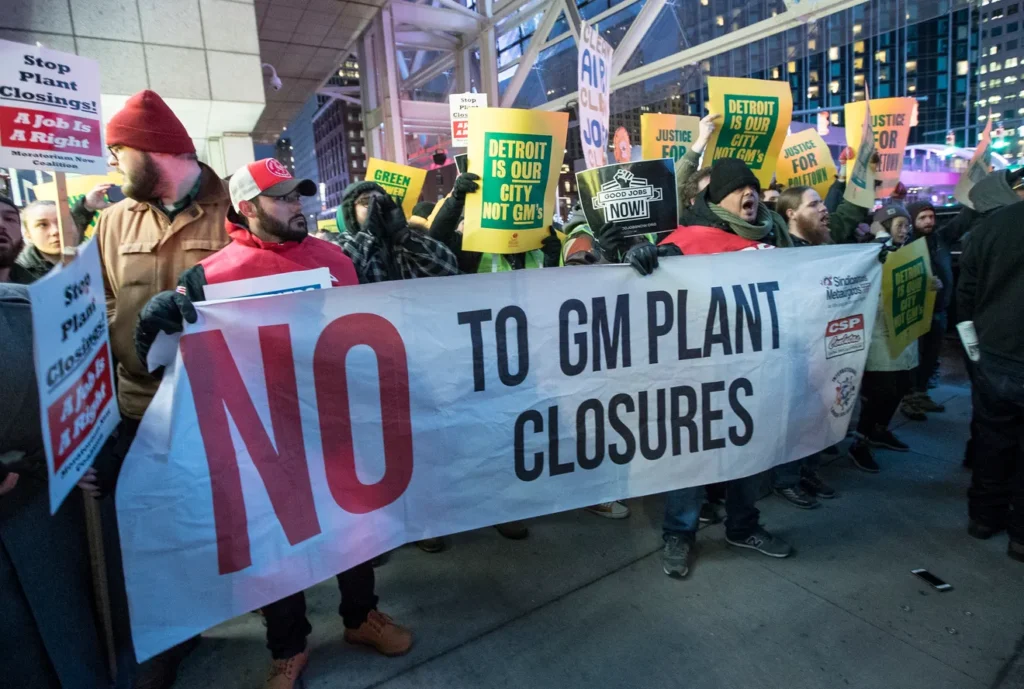 GM workers from the US, Canada, and Brazil demonstrate against plant closings at the Detroit International Auto Show January 18, 2019